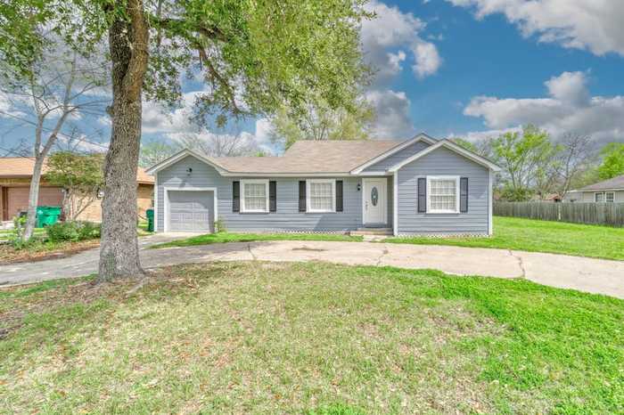 photo 1: 406 N Woodrow Street, Madisonville TX 77864