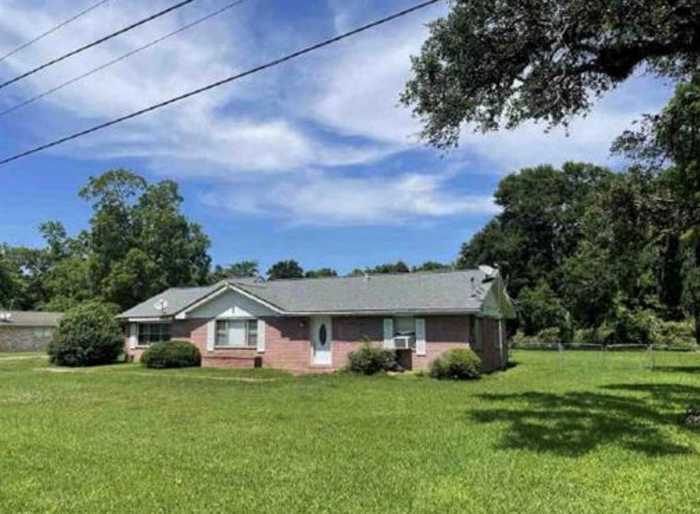 photo 1: 315 Lee Avenue, Jones Creek TX 77541