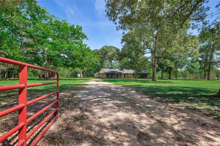 photo 1: 206 N Duck Creek Road, Cleveland TX 77328