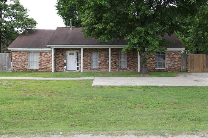 photo 1: 710 E Houston Street, Highlands TX 77562