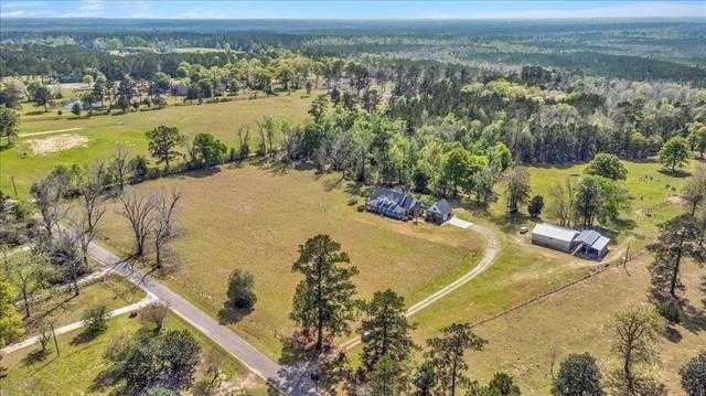 photo 1: 13382 County Road 701, Buna TX 77612