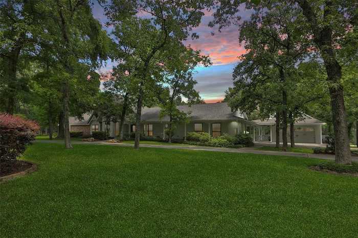 photo 1: 10050 Pine Springs Drive, Conroe TX 77304