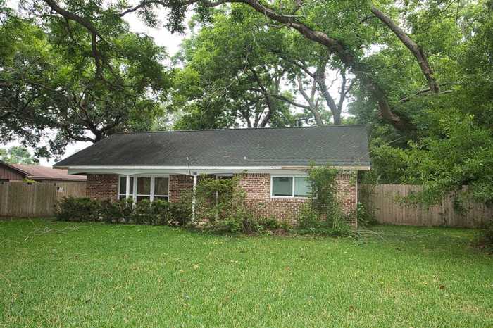 photo 1: 318 Primrose Road, Jones Creek TX 77541