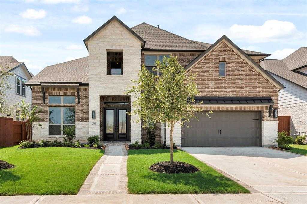 photo 1: 7419 Butterfly Blossom Lane, Katy TX 77493