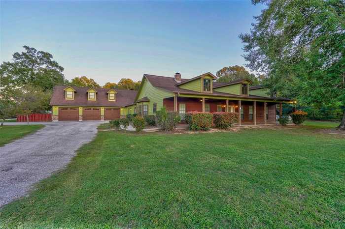 photo 1: 10125 Fostoria Road, Cleveland TX 77328