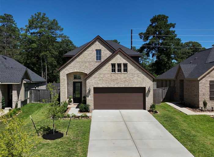 photo 2: 35448 Woodtrace Circle, Pinehurst TX 77362