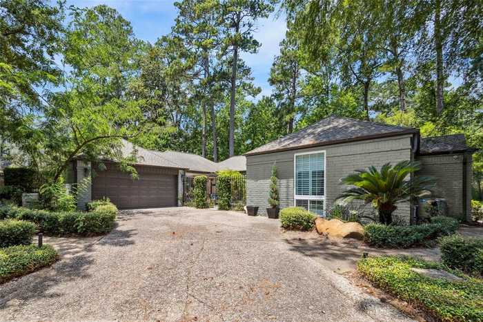 photo 1: 3102 Breezy Pines Court, Kingwood TX 77339