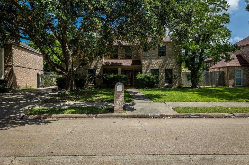 photo 1: 11506 Wickersham Lane, Houston TX 77077