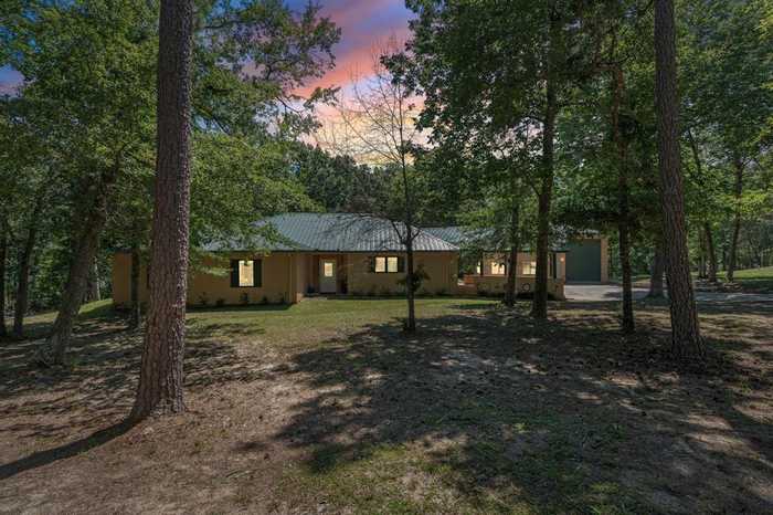 photo 1: 100 Kings Point Drive, Coldspring TX 77331