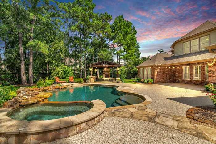 photo 1: 71 E Hullwood Court, The Woodlands TX 77389