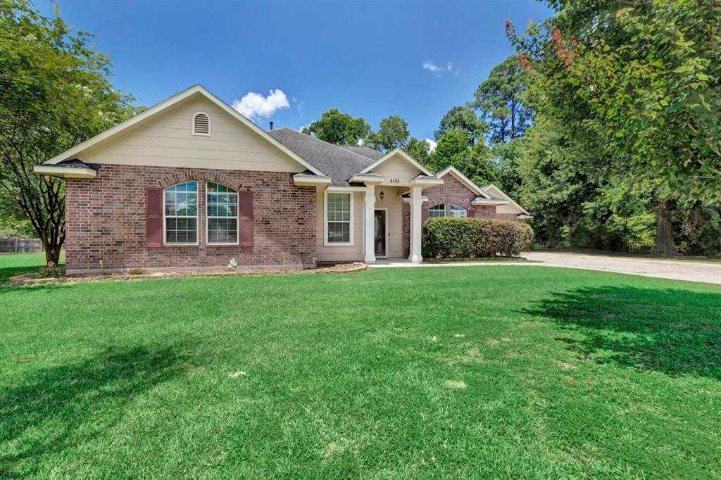 photo 1: 409 Mildred Street, Cleveland TX 77328