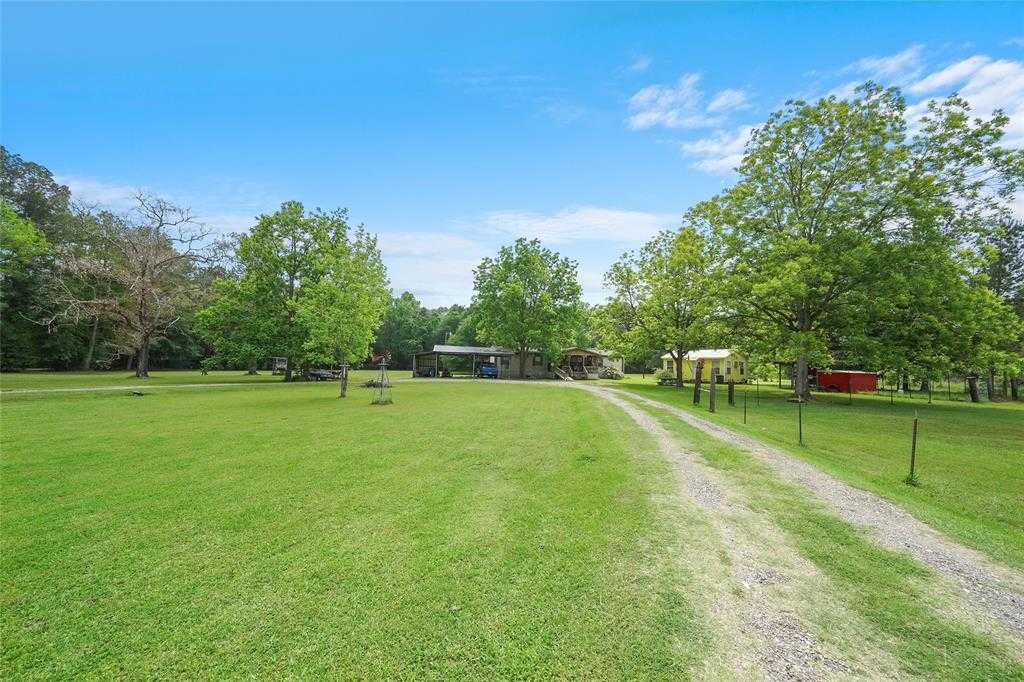 photo 1: 172 Jackson Road, Coldspring TX 77331