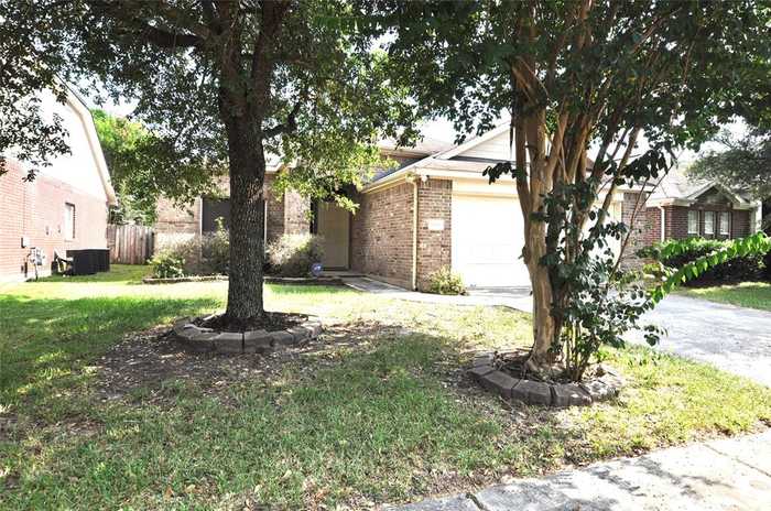 photo 1: 21582 Duke Alexander Drive, Kingwood TX 77339