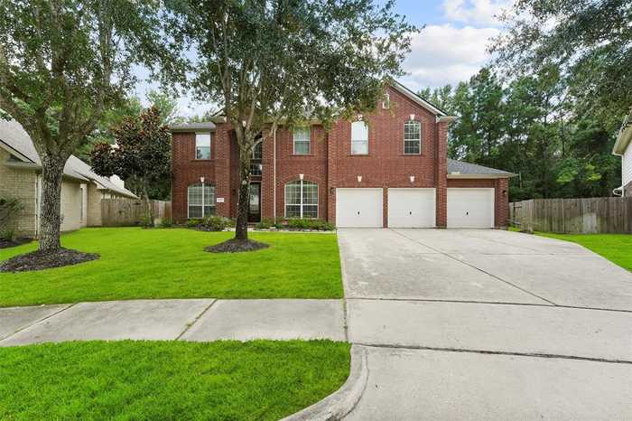 photo 1: 13602 Darby Rose Lane, Houston TX 77044