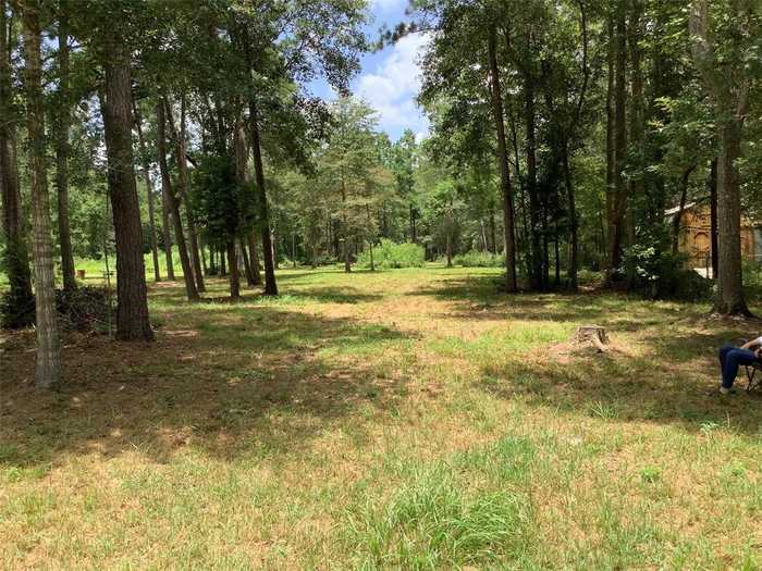 photo 1: 3893 TBD COUNTY ROAD 3893 Rock Creek, Cleveland TX 77328