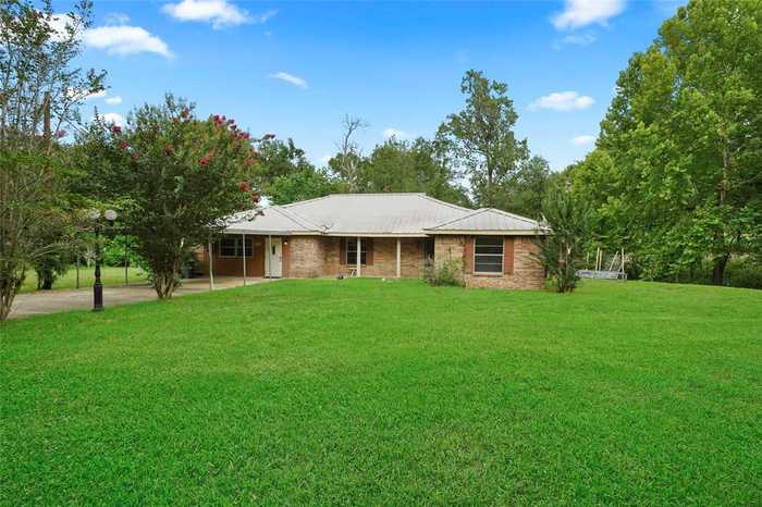 photo 1: 101 Walnut Drive, Coldspring TX 77331