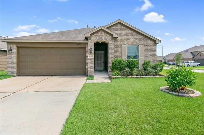 photo 1: 14402 Hidden Key Court, Houston TX 77090