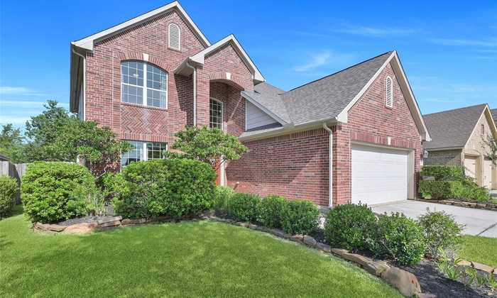 photo 2: 31815 Oak Thicket Court, Conroe TX 77385