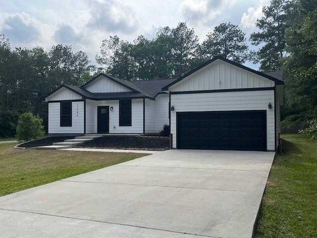 photo 1: 11084 N Woods, Cleveland TX 77328