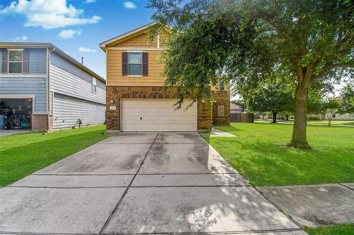 photo 1: 16606 Burnell Oaks Lane, Houston TX 77090