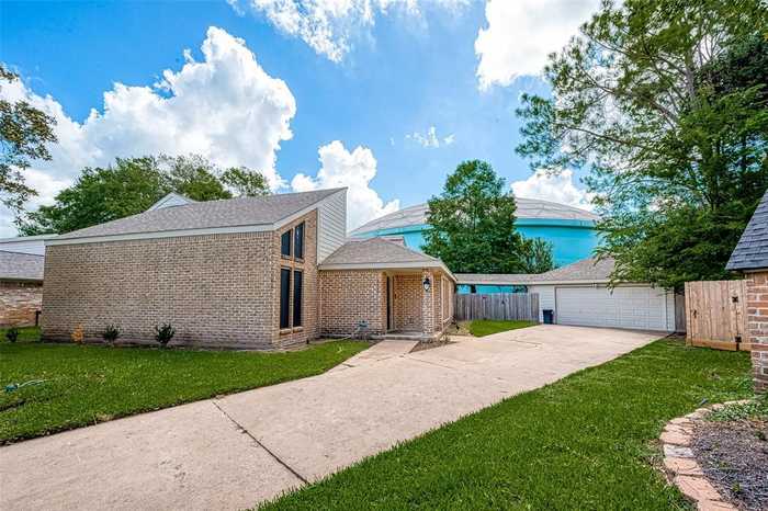 photo 1: 1623 Cherry Ridge Drive, Houston TX 77077