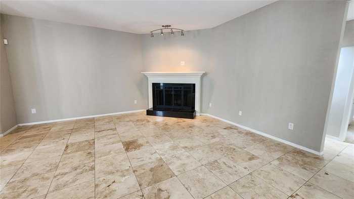 photo 1: 9809 Richmond Avenue Unit H12, Houston TX 77042