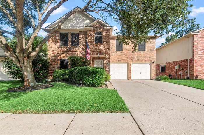 photo 1: 26899 Castlecliff Lane, Kingwood TX 77339