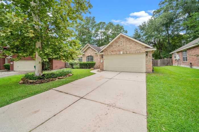 photo 1: 11 Teak Mill Place, The Woodlands TX 77382