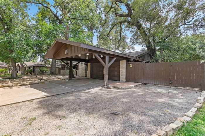 photo 1: 1202 Burning Tree Road, Houston TX 77339