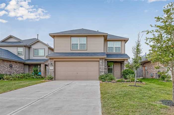 photo 1: 1234 Blue Hazel Court, Pinehurst TX 77362