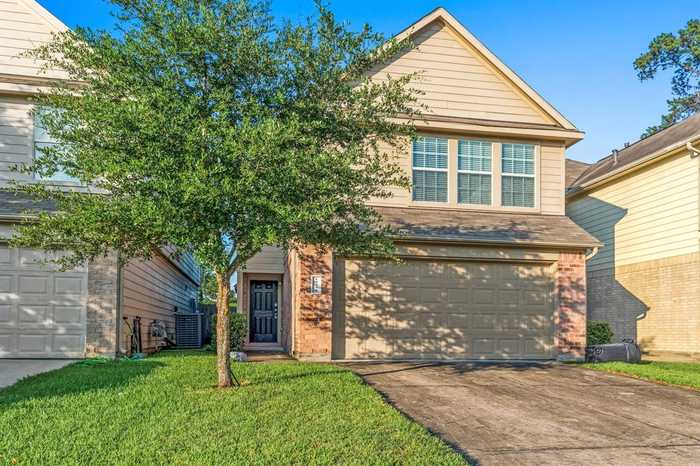 photo 1: 15434 Bammel Oaks Court, Houston TX 77014