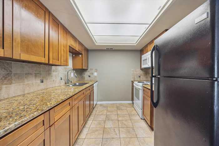 photo 1: 2814 S Bartell Drive Unit J5, Houston TX 77054