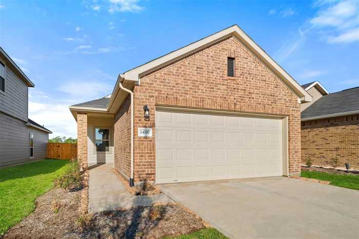 photo 1: 24704 Stablewood Forest Court, Huffman TX 77336