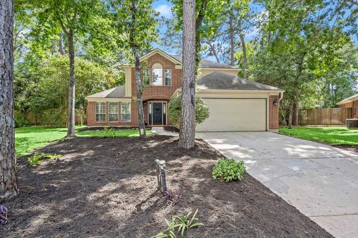 photo 1: 114 Snowdance Court, The Woodlands TX 77382