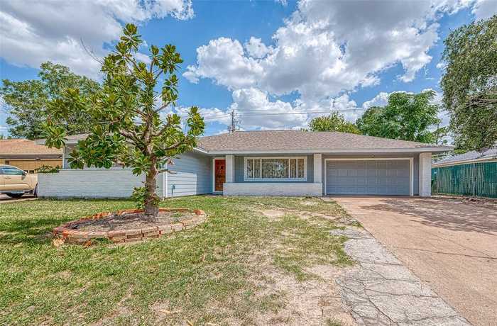 photo 1: 7949 Longridge Drive, Houston TX 77055