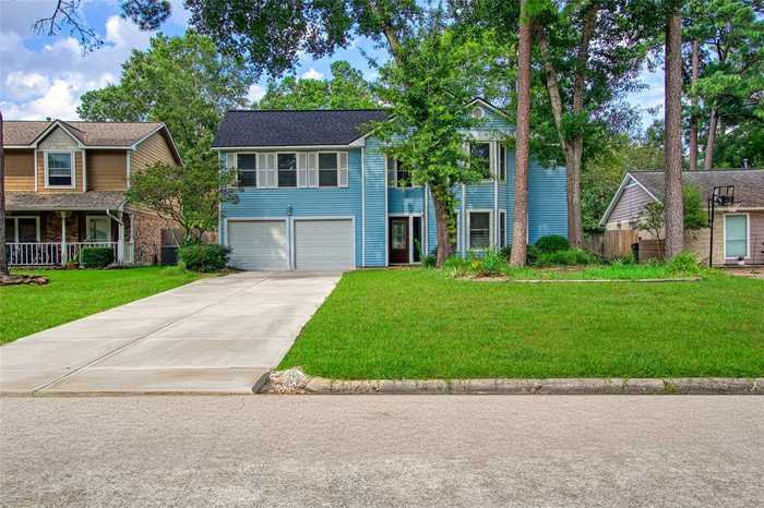 photo 1: 5006 Shady Gardens Drive, Houston TX 77339