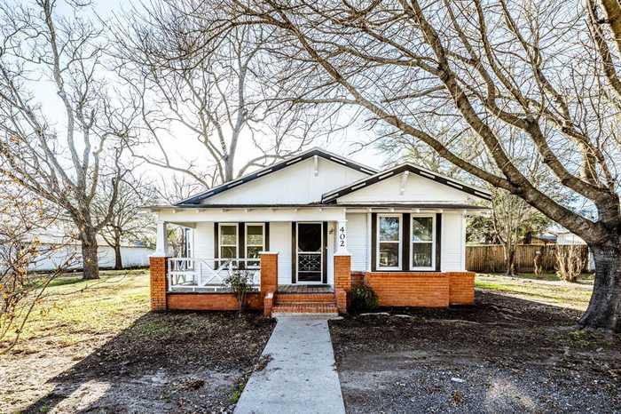 photo 1: 402 S Madison Street, Madisonville TX 77864