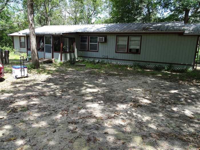 photo 2: 3675 Woodpeckers Grove, Cleveland TX 77328