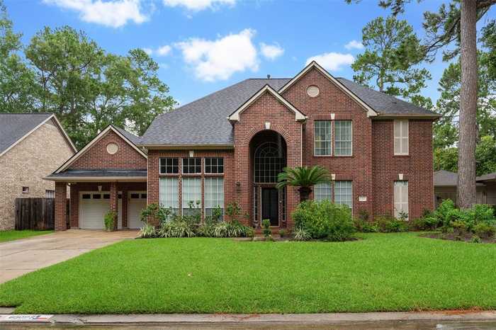 photo 1: 6306 Gladehill Drive, Houston TX 77345