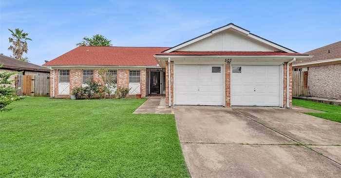 photo 1: 507 Mistywood Drive, Houston TX 77090