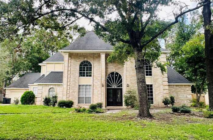 photo 1: 5003 Maple Terrace Drive, Houston TX 77345