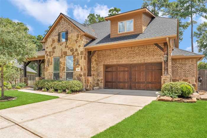 photo 1: 203 Gaillardia Court, Pinehurst TX 77362