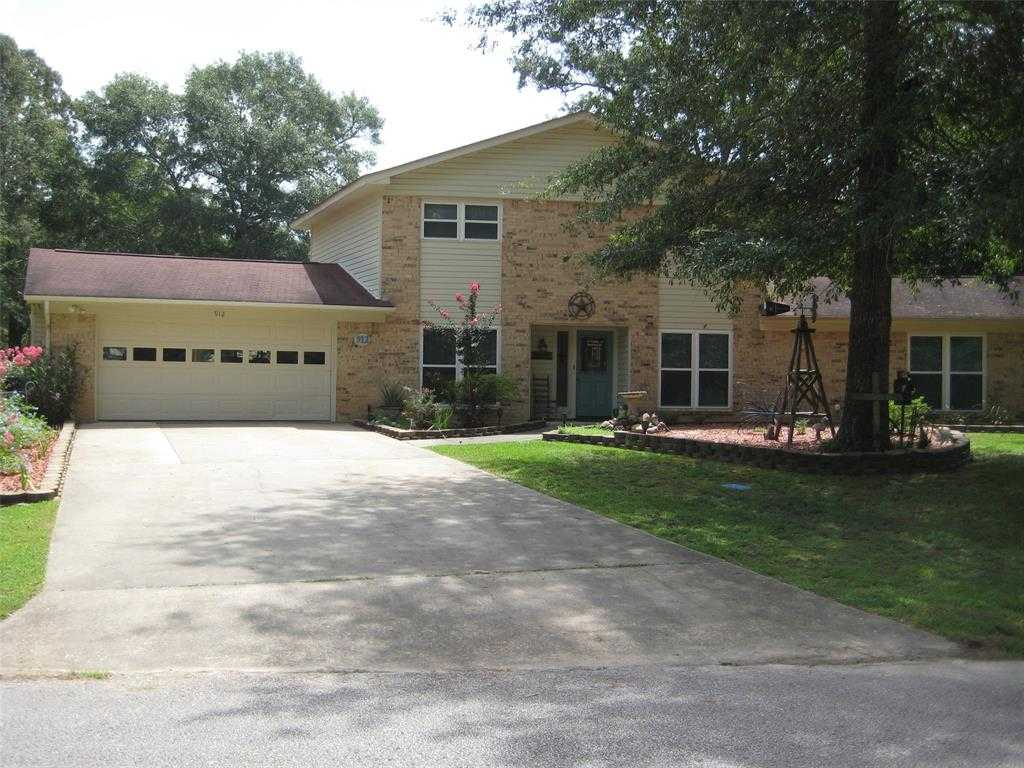 photo 1: 912 Wildwood Drive, Village Mills TX 77663