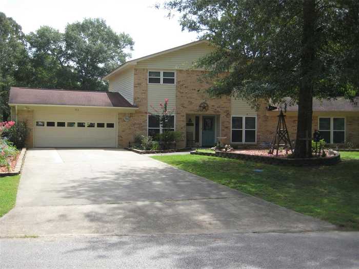 photo 1: 912 Wildwood Drive, Village Mills TX 77663