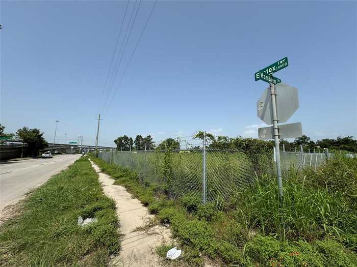 photo 1: 14900 Highway 59, Houston TX 77396