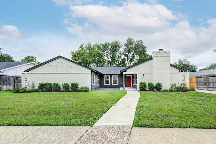 photo 1: 10607 Deerwood Road, Houston TX 77042