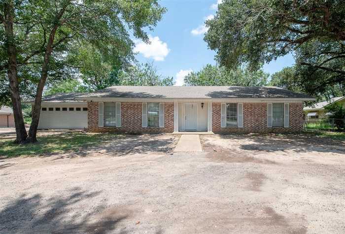 photo 1: 1307 E Main Street, Madisonville TX 77864