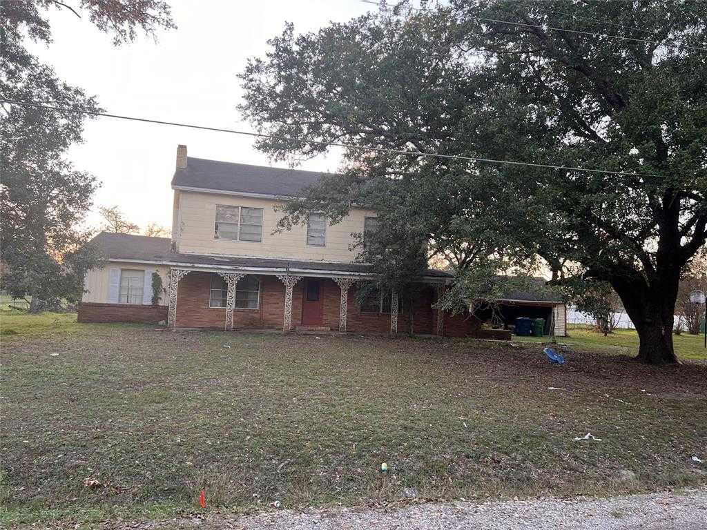 photo 1: 305 N Panama Street, Madisonville TX 77864