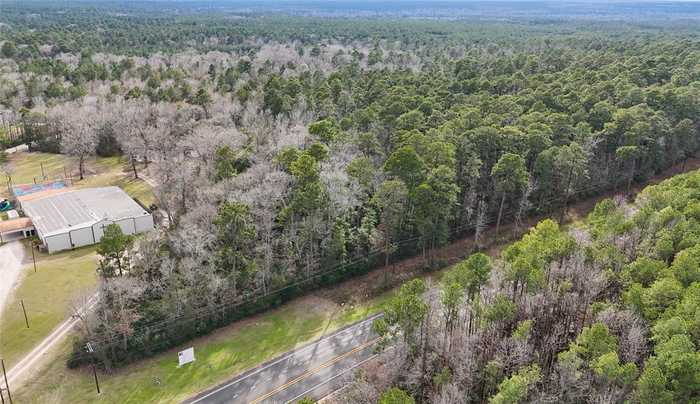 photo 1: Hwy 150, Coldspring TX 77331