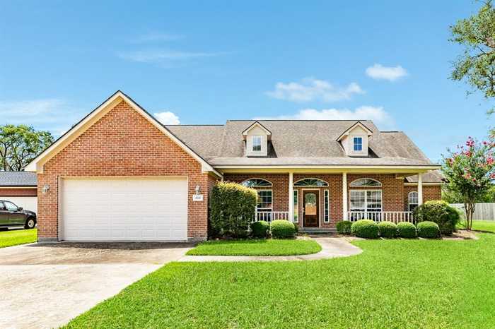 photo 1: 1111 Spreading Oaks Drive, Angleton TX 77515